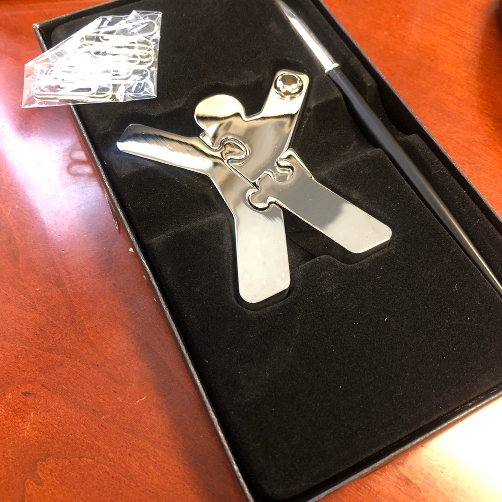 Puzzle  pen and paper clip desk stand